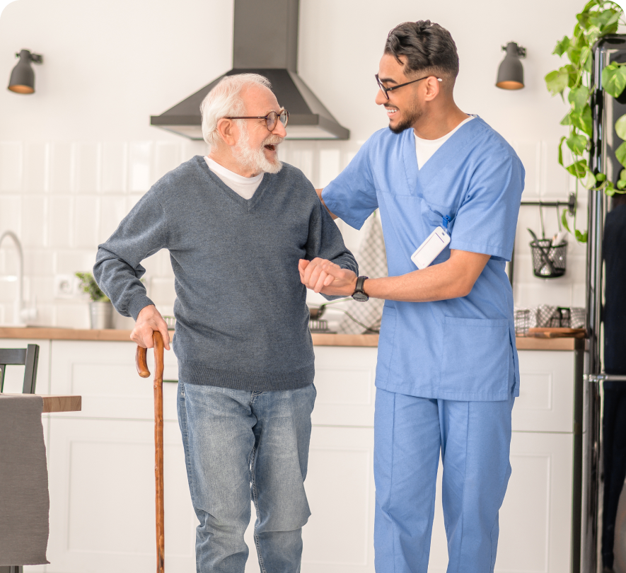 Nurse helping senior man walk with cane